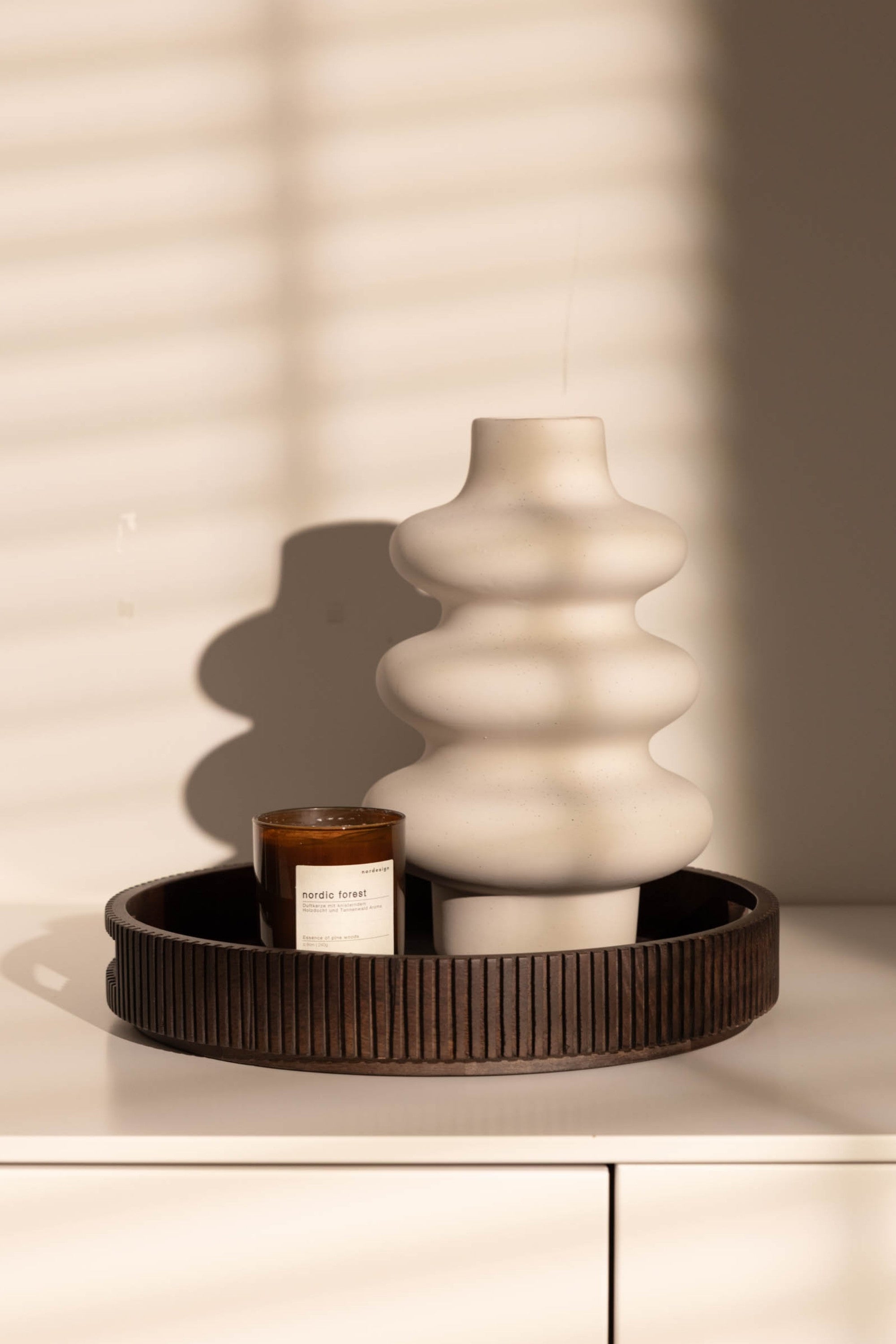 Duftkerze mit knisterndem Holzdocht